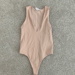 out from under ribbed light pink v neck bodysuit size small